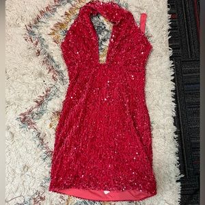 Sparkly pink mini dress.